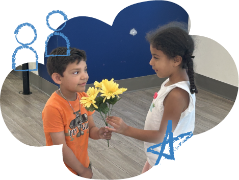 Two Students Holding Flowers at Summer Camp Learning Social Emotional Learning